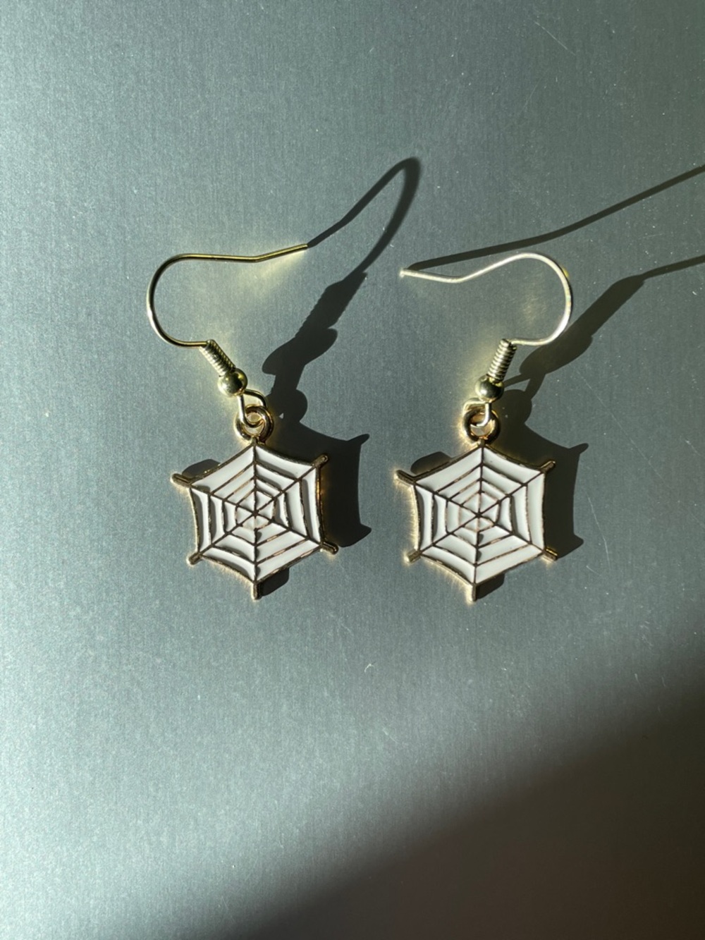 Gold Spiderweb Drop Earrings — White Enamel